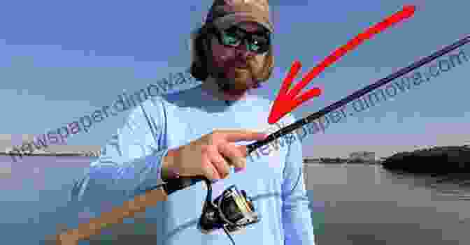 Angler Holding A Fishing Rod With A Homemade Crankbait, Testing Its Performance In A River. How To Make Fishing Lures Polymer Crankbaits With 15 Designs