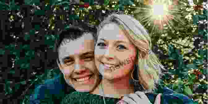 Emily And Ethan Sharing A Romantic Moment In The Snowy Town Blame It On Christmas: An Enemies To Lovers Romance (Southern Secrets 1)